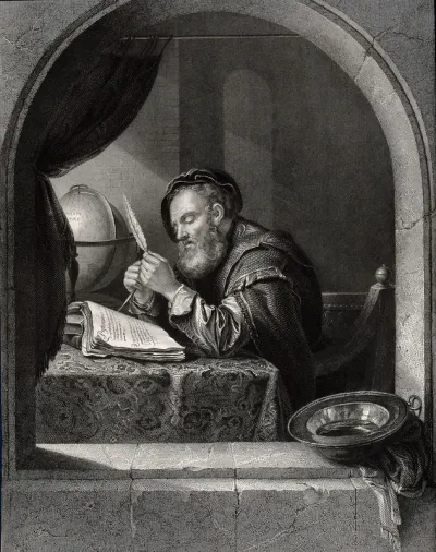 A seated man sharpening a quill pen