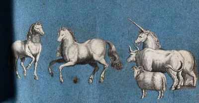 A sheep, two horses, a cow and a unicorn