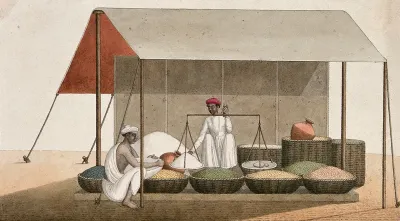 A shopkeeping weighing grains for a customer
