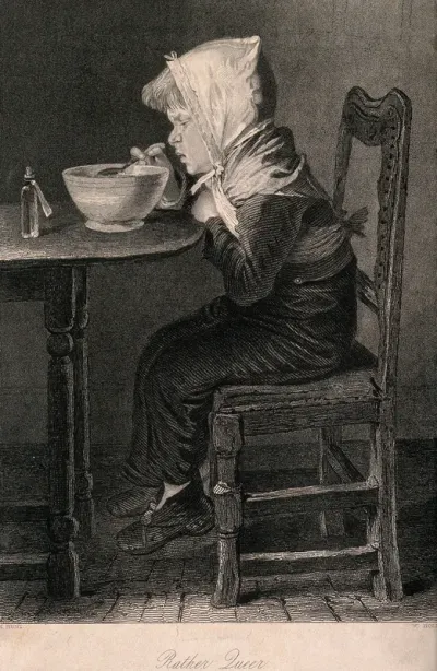 A sick boy pulling a peculiar face after eating some gruel which also contained some medicine