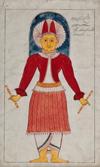 A Sinhalese devil called Dewel, wearing a headdress and carrying a stick (?)in each hand