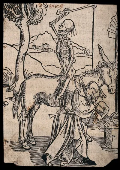 A skeleton sits backwards on a horse waiting for a blacksmith, dressed as a fool, to finish his job