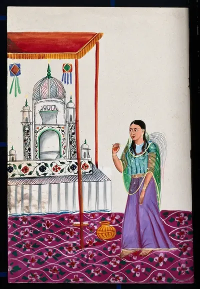 A small mosque under a canopy being attended to by a woman holding a fly whisk