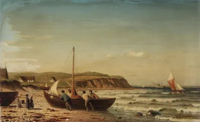 A small sailboat being dragged ashore.