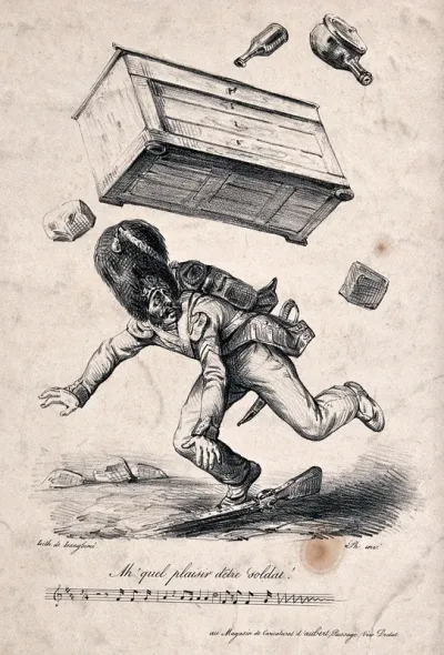 A soldier has dropped his rifle and is falling as a wardrobe and other items fall down around his head