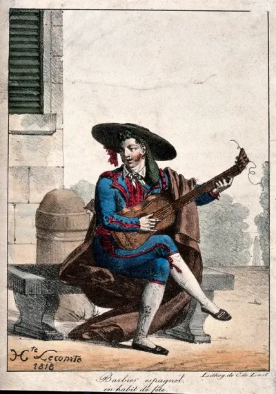 A Spanish barber playing the guitar