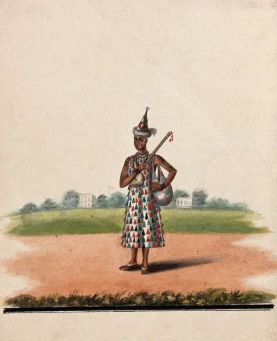 A street performer carrying a musical instrument