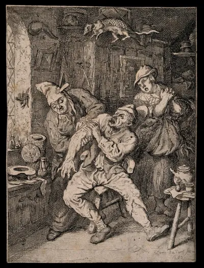 A surgeon applying a probe to the arm of a screaming patient