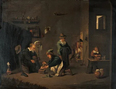 A surgeon removing a plaster from a man's foot