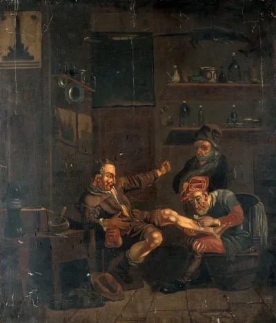 A surgeon treating a man's foot