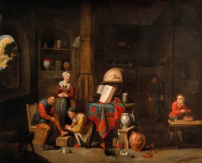 A surgeon treating an injury to a man's foot