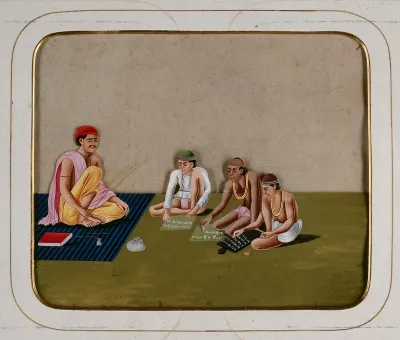 A teacher giving lessons to three children who are busy writing