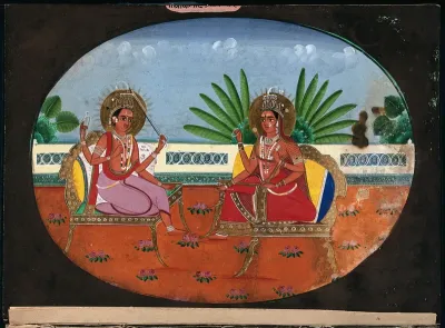 A three eyed Hindu deity with four arms sitting across a goddess with four arms holding rosary beads