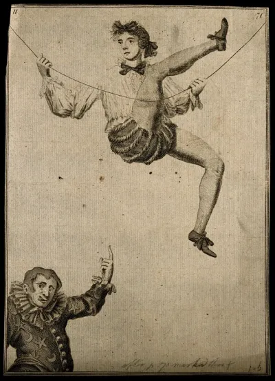 A tightrope walker above a clown