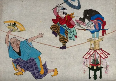 A tightrope walker and two other acrobats