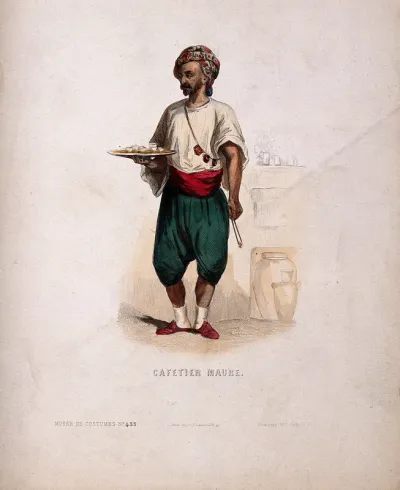 A Turkish coffee vendor with a tray of coffee cups