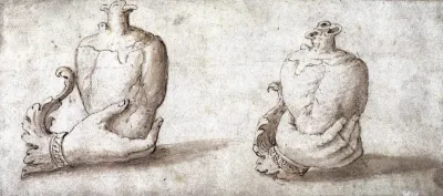 A vessel in the form of a heart held by a hand: lateral and three-quarter views