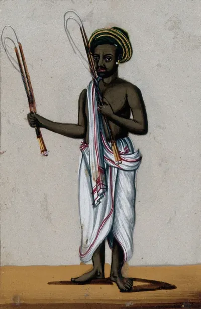 A whip seller holding his whips