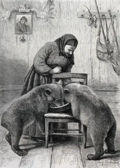 A woman feeding two bear cubs from a large bowl on a chair