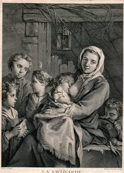 A woman from Savoy breastfeeds a baby and other children stand around her