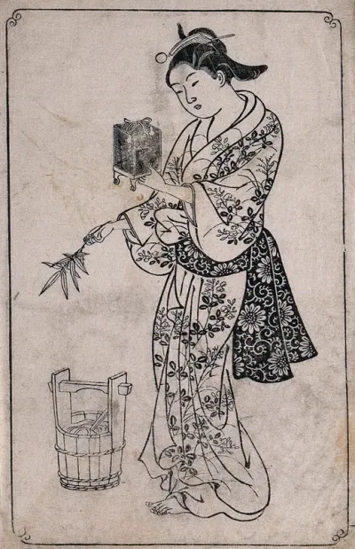 A woman holding a cricket cage