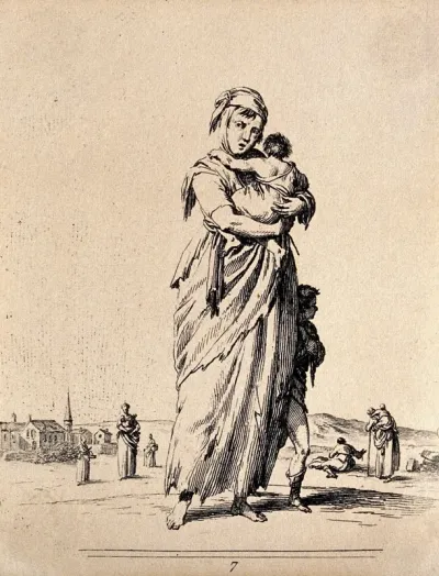 A woman in ragged clothing is carrying one child as another walks by her side