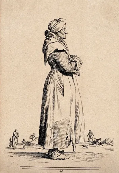 A woman in ragged clothing