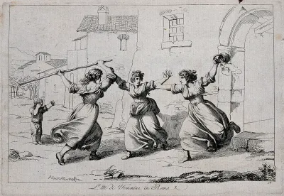 A woman in Rome is trying to separate two women fighting, one is holding a stick, the other is holding a bucket; a child crying in the background
