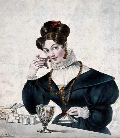 A woman perfume-seller holds a small lavender bag up to her face
