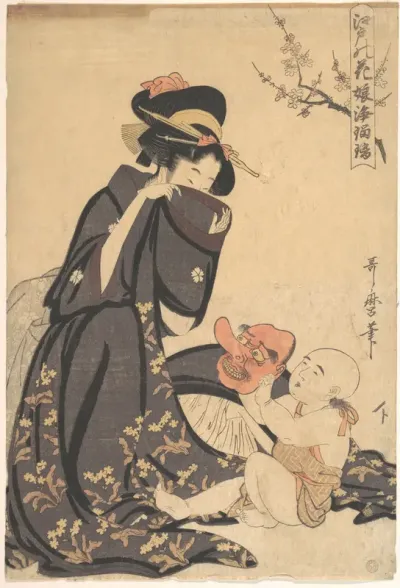 A Woman Playing with a Young Boy