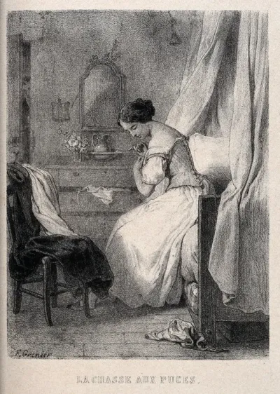 A woman sitting on a bed picking fleas from her clothes