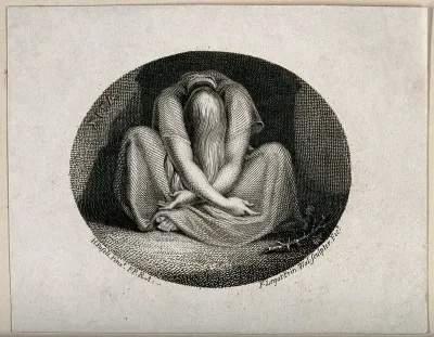 A woman sitting on the ground with crossed legs, her head covered in her lap; representing Silence