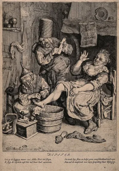A woman surgeon and her assistant cupping a patient