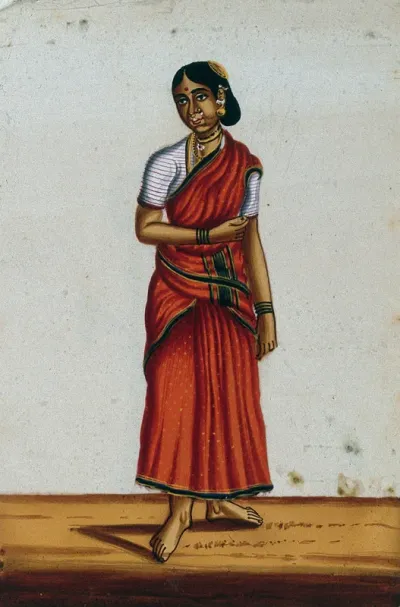 A woman wearing a red sari