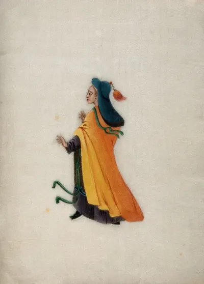 A woman wearing brightly coloured robes and a tasselled head dress