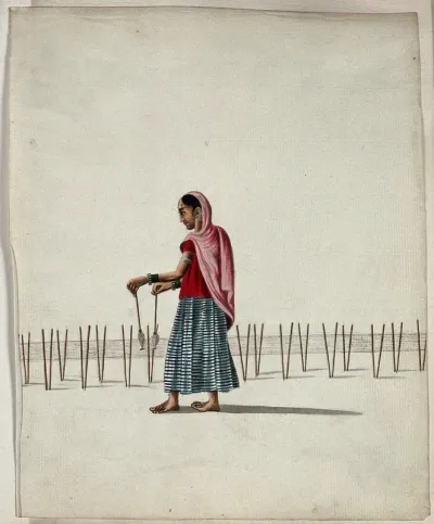 A woman winding thread onto spindles (?)