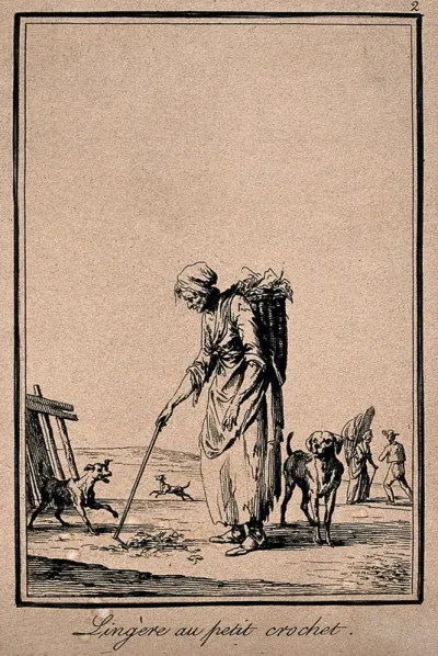 A woman with a basket on her back is using a stick to gather bits from the ground