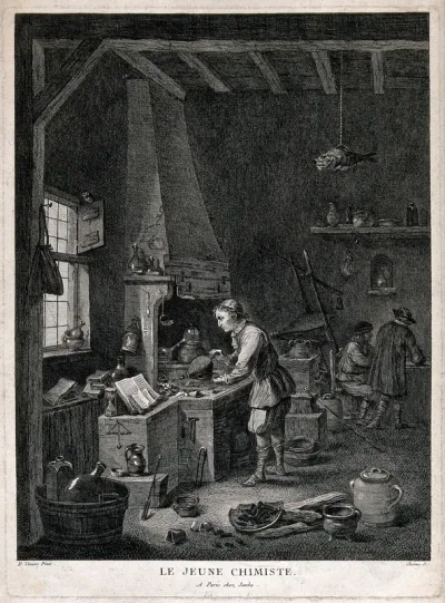 A young alchemist works a bellows at his furnace