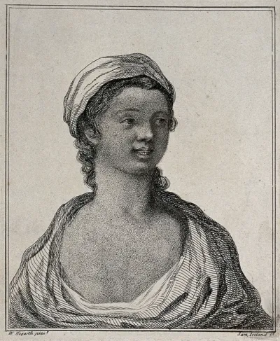 A young black woman with a head-scarf