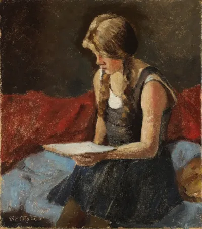 A young girl reading a book.