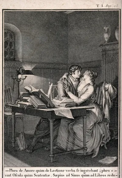 A young man and a young woman embrace each other at a table piled with books