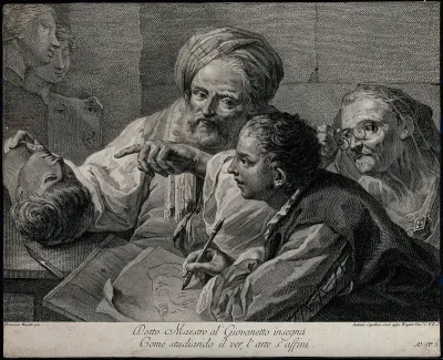 A young man being instructed in drawing by an older man