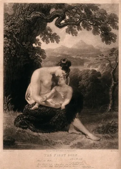 A young mother cradles her child in her arms
