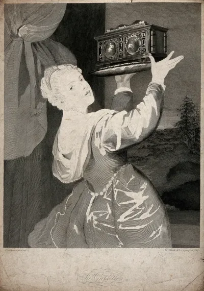 A young woman holding up a casket on a dish as she looks back over her shoulder
