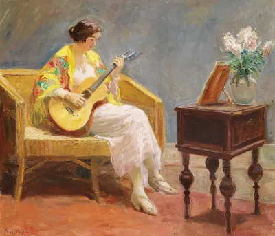 A young woman playing the guitar, sitting in a wicker sofa.