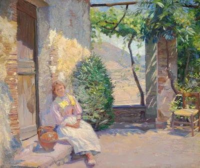 A young woman sitting with her water jug in front of a house in Anticoli Corrado in the Sabine hills