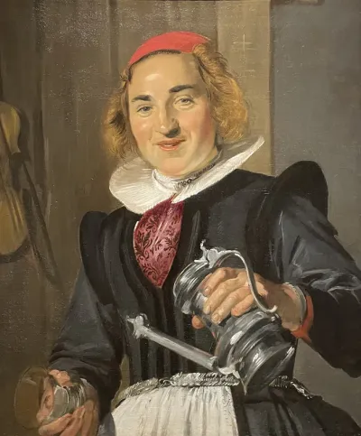 A young woman with a glass and flagon