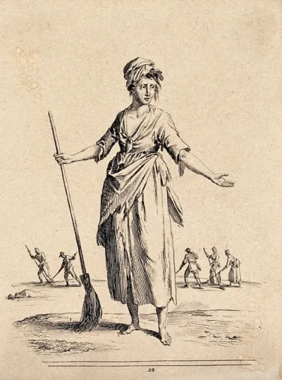 A young women sweeping the street holds a broom in one hand and holds out the other hand for payment