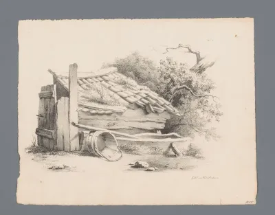 Achterkant van een stal met voederbak