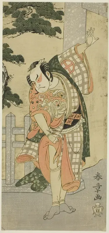 Actor Ôtani Hiroji III Striking a Stage Pose before a Stone Gateway